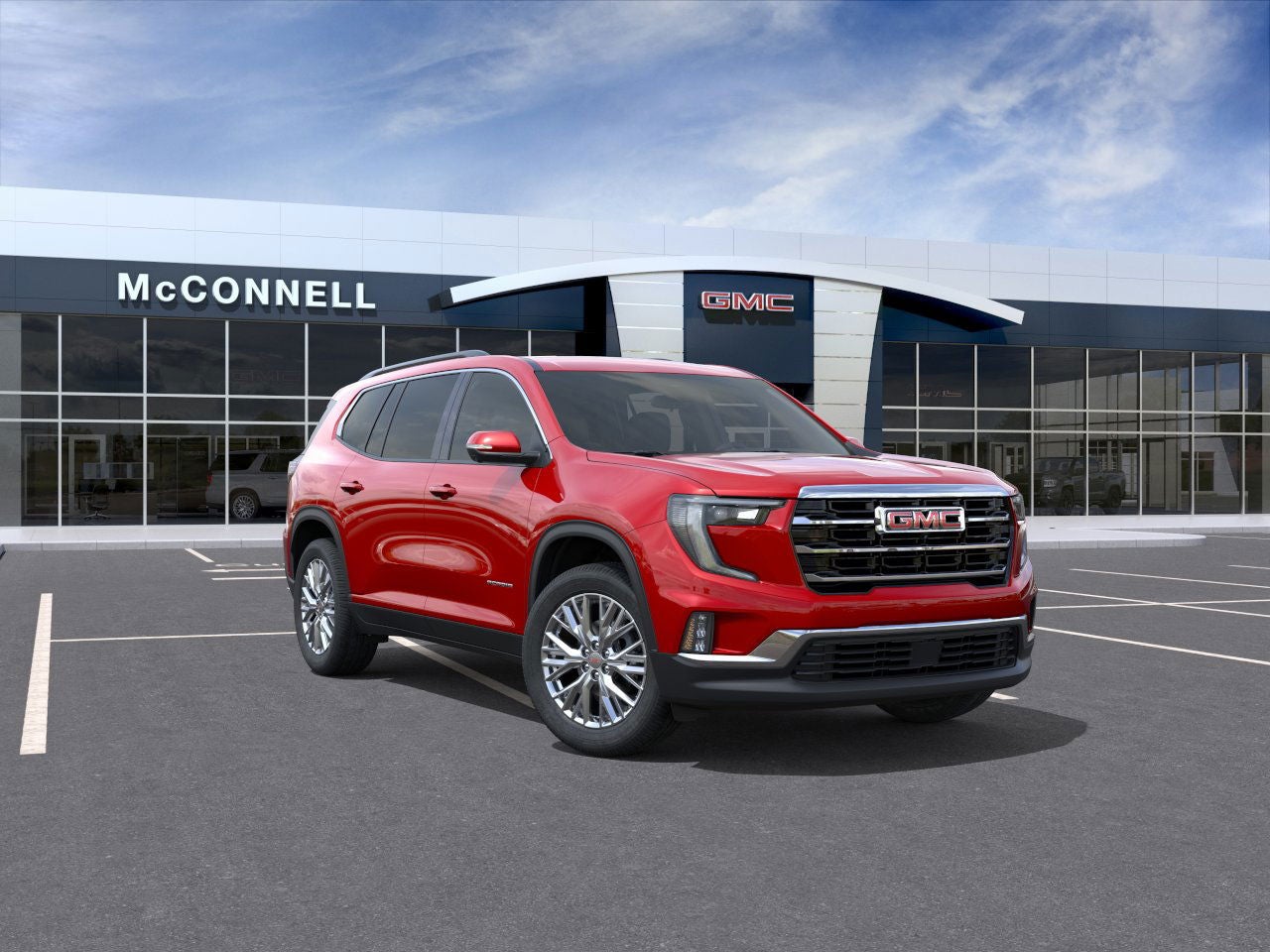 2026 GMC Acadia Elevation in Volcanic Red Tintcoat — front three-quarter view