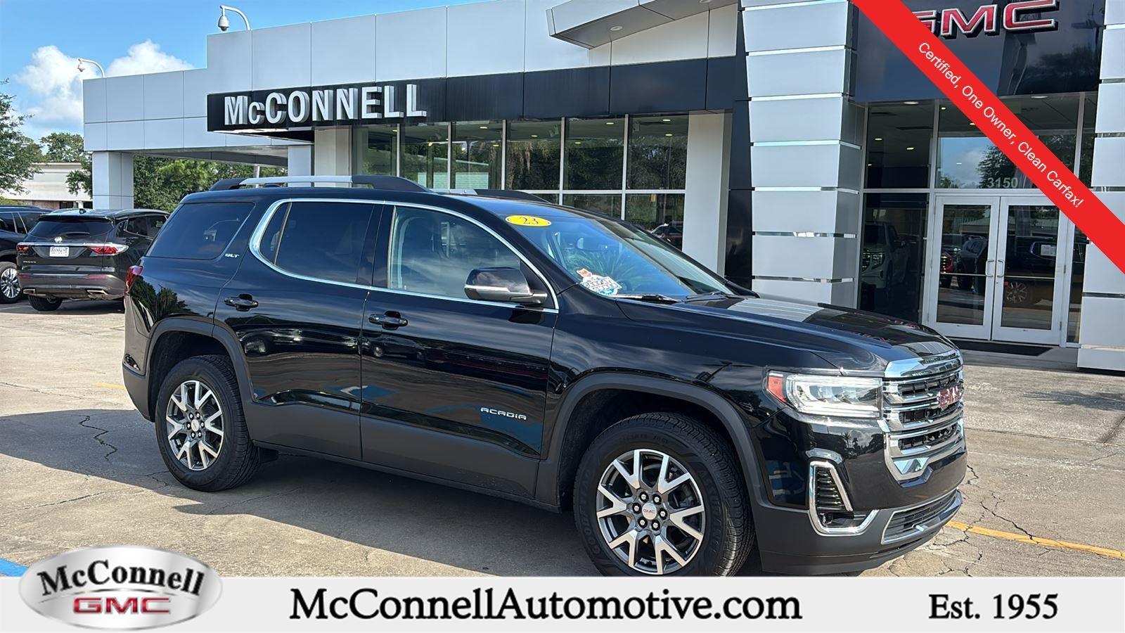 2023 GMC Acadia SLT in Ebony Twilight Metallic — front three-quarter view