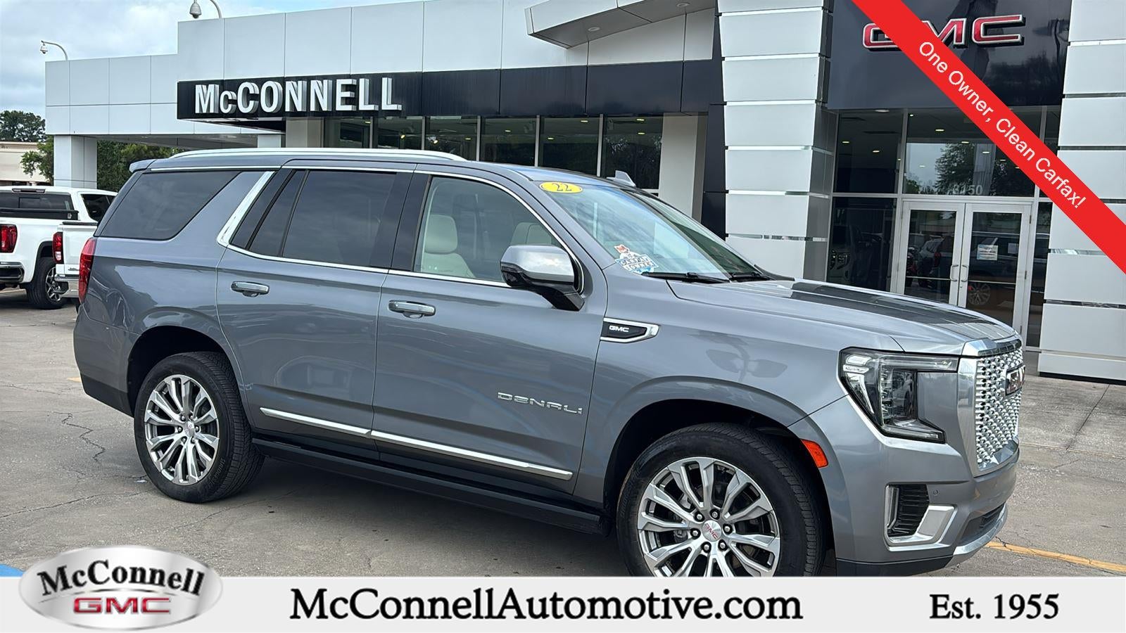 2022 GMC Yukon Denali in Satin Steel Metallic — front three-quarter view