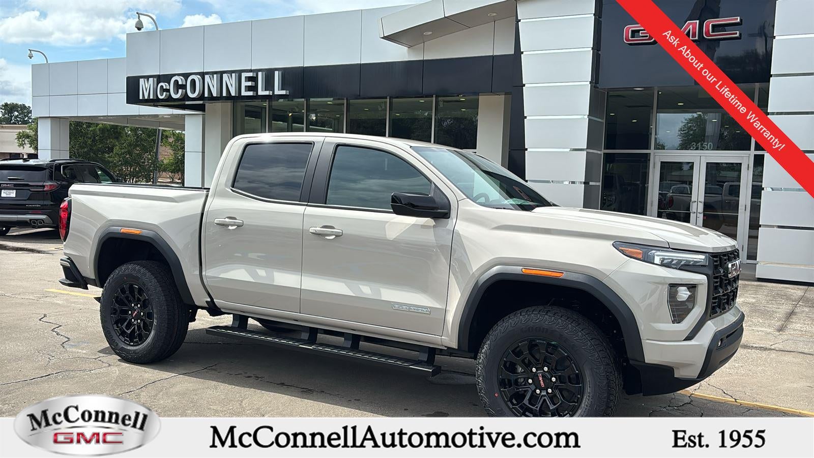 2026 GMC Canyon Elevation in Coastal Dune — front three-quarter view