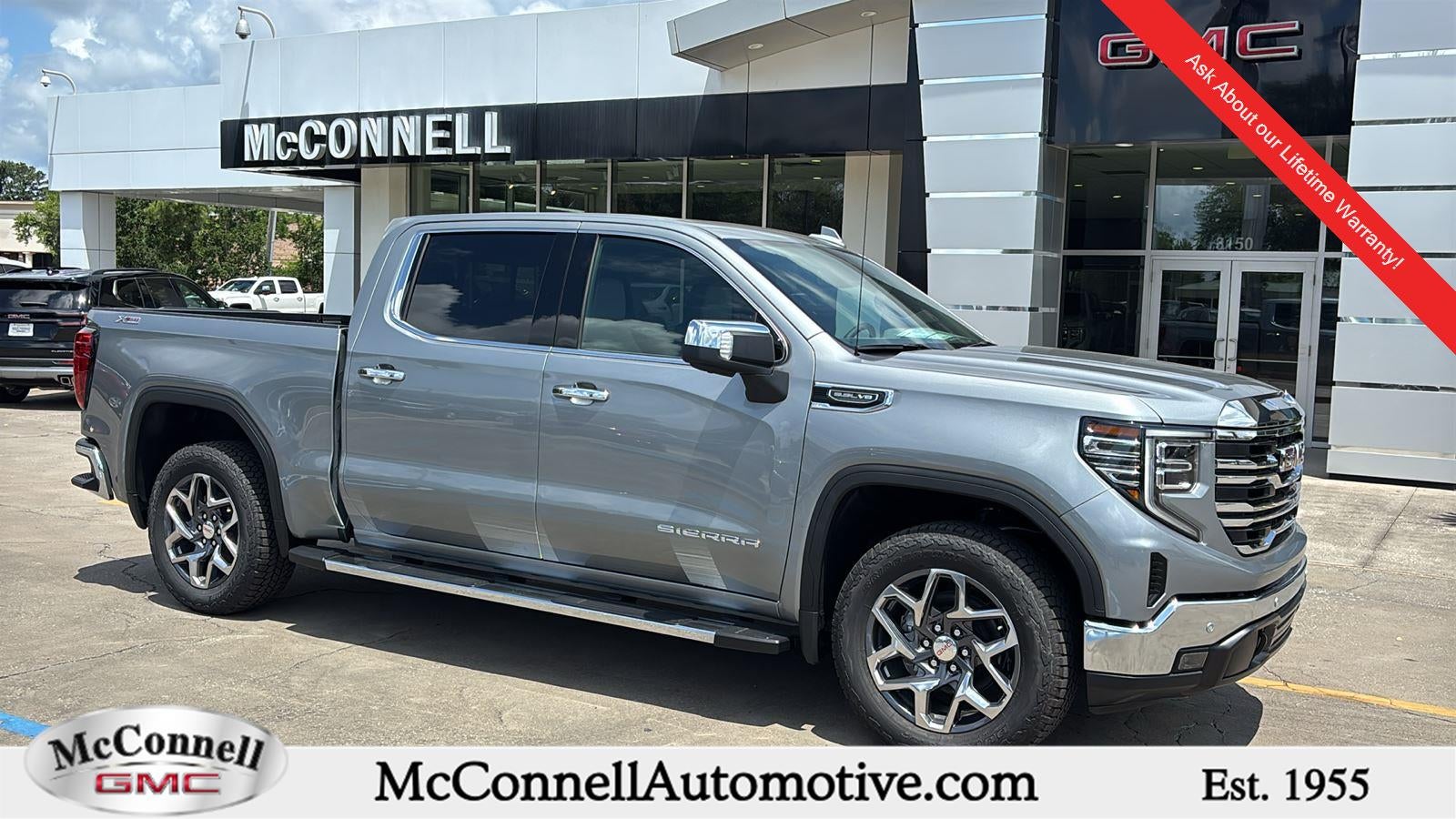 2026 GMC Sierra 1500 SLT in Sterling Metallic — front three-quarter view