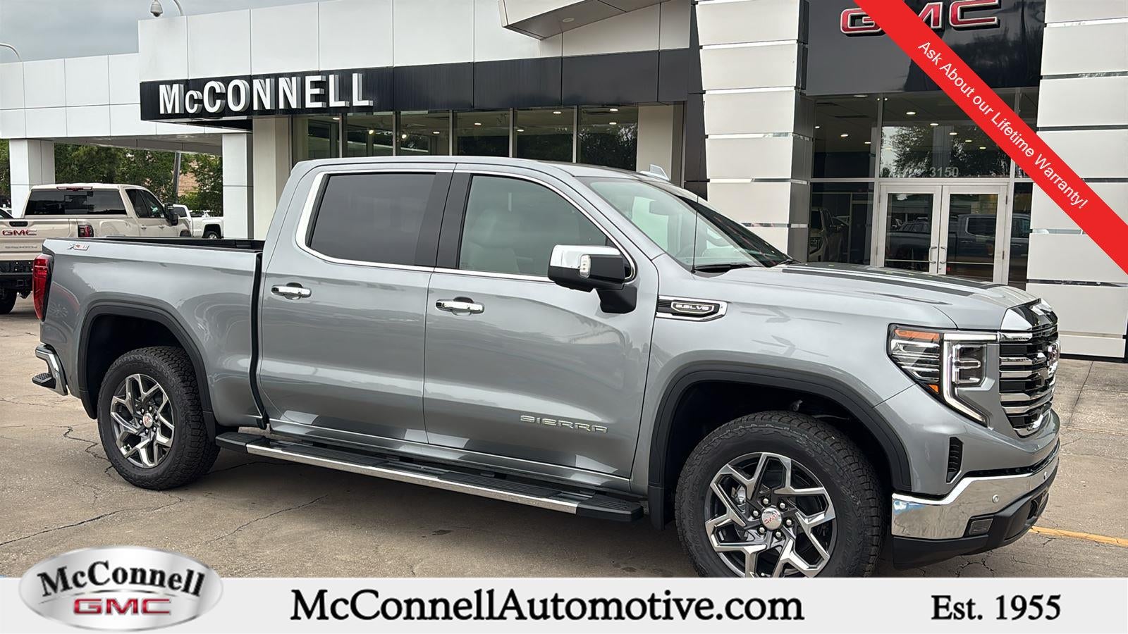 2026 GMC Sierra 1500 SLT in Sterling Metallic — front three-quarter view