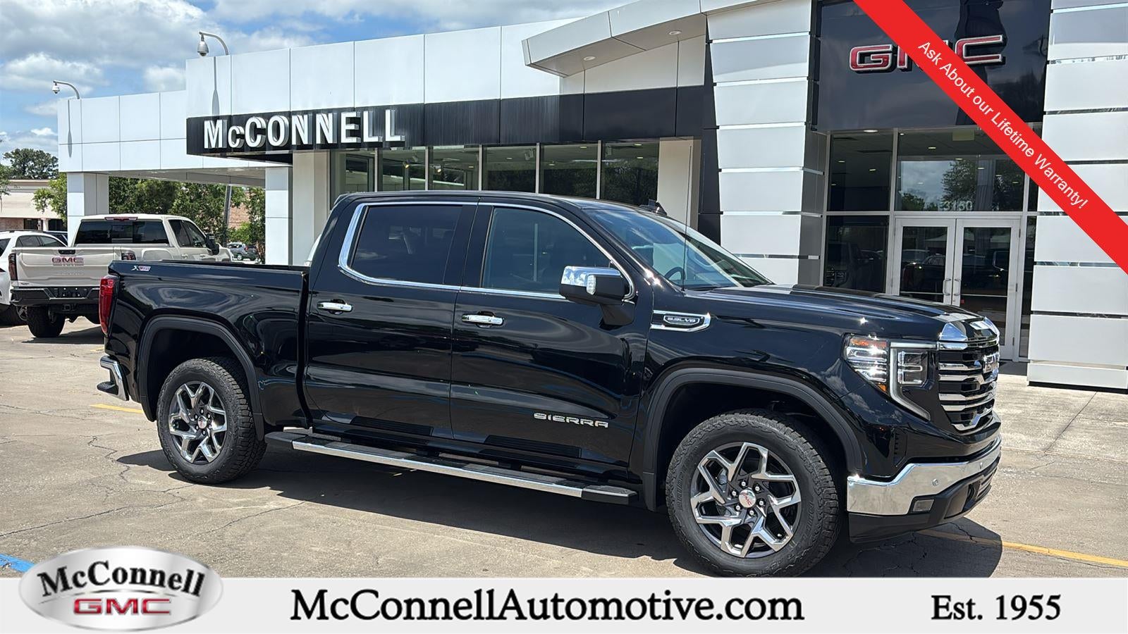 2026 GMC Sierra 1500 SLT in Onyx Black — front three-quarter view