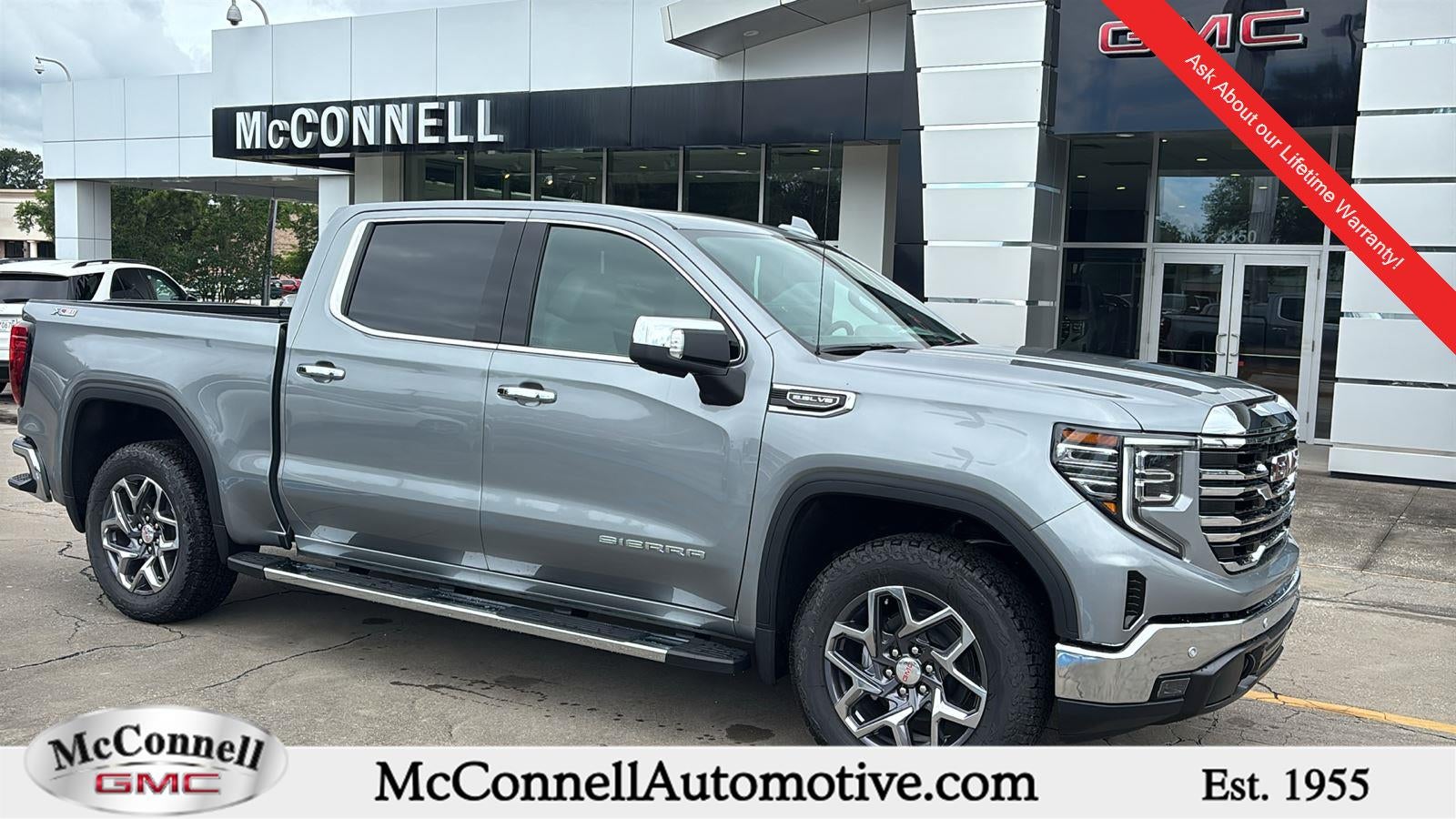 2026 GMC Sierra 1500 SLT in Sterling Metallic — front three-quarter view