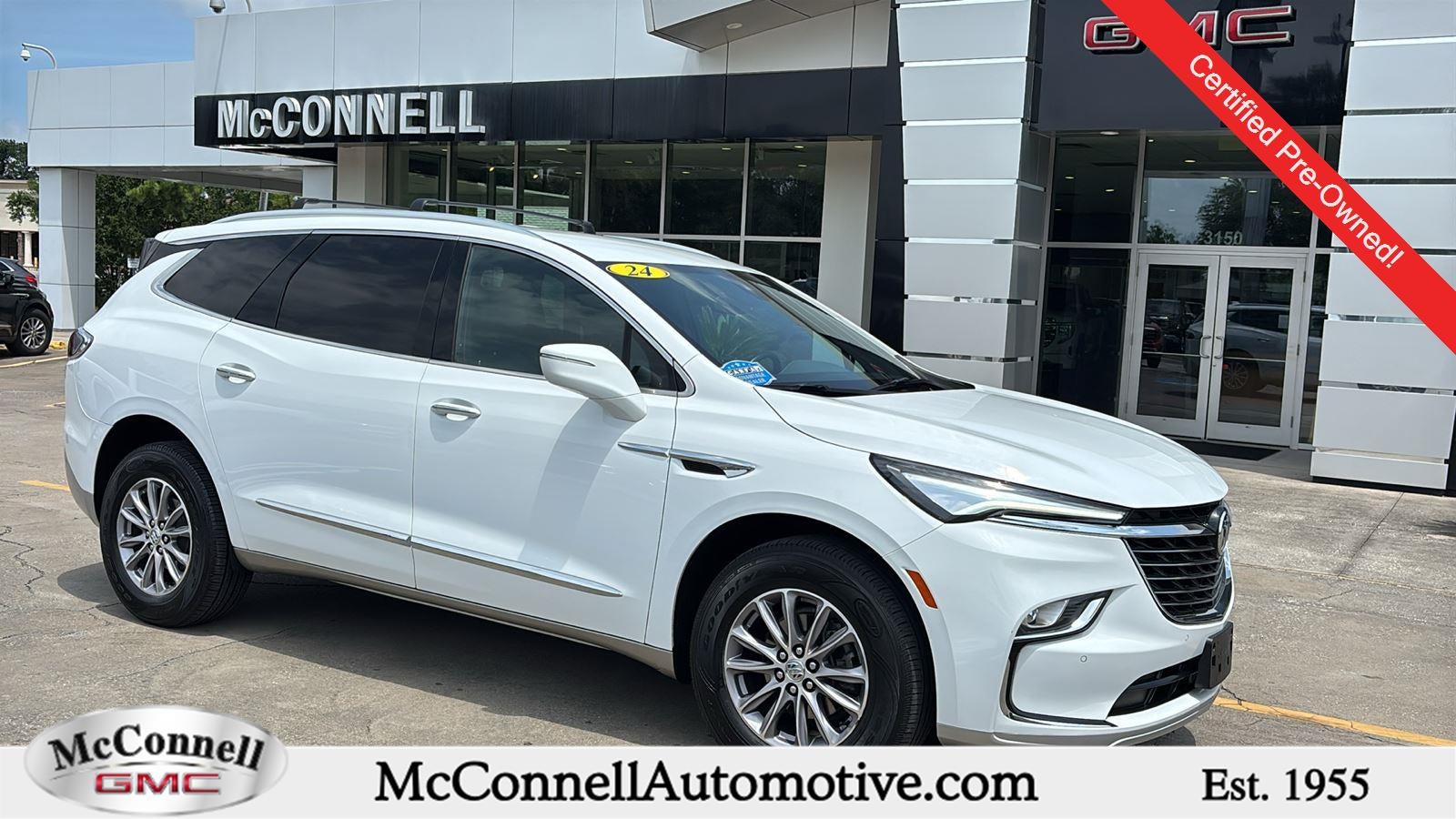 2024 Buick Enclave Essence in Summit White — front three-quarter view